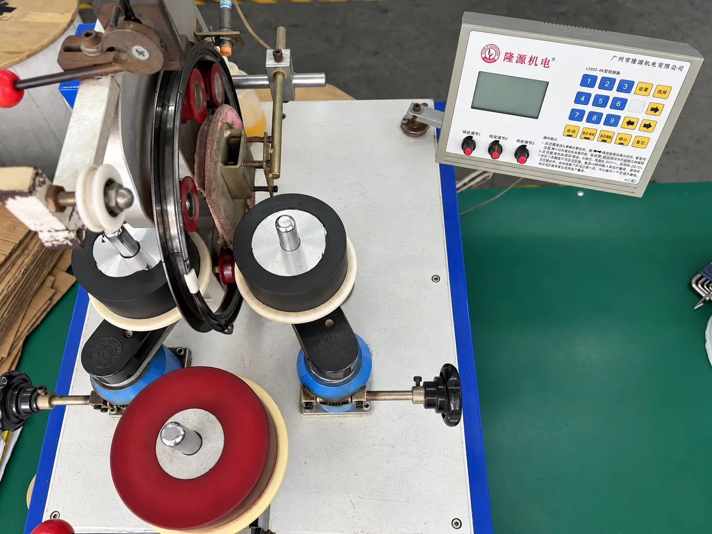 Automatic toroidal winding equipment at KATOY